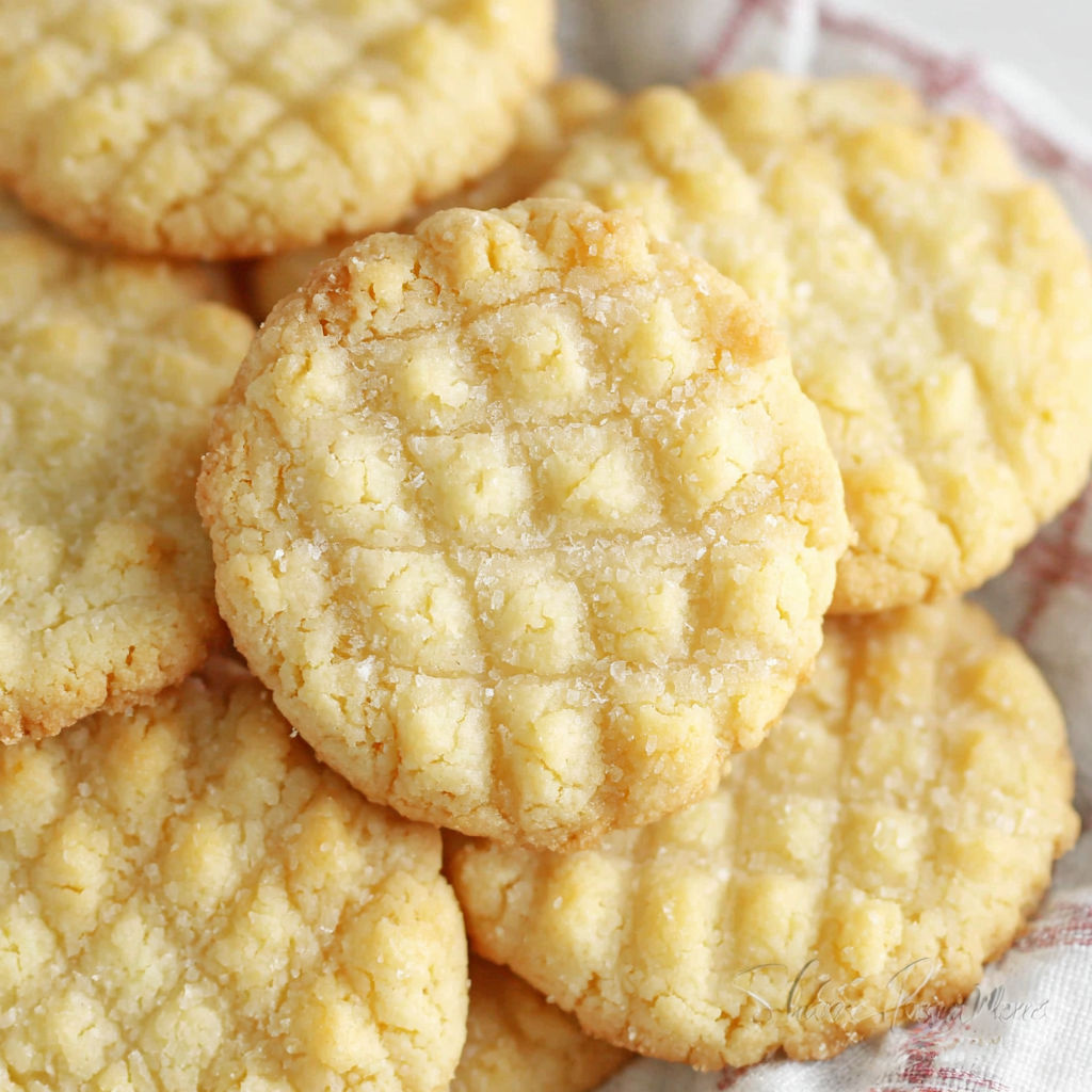 A plate of cookies with a white and yellow color.