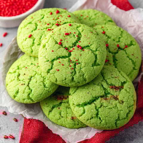 Grinch sugar cookies with red and green frosting.