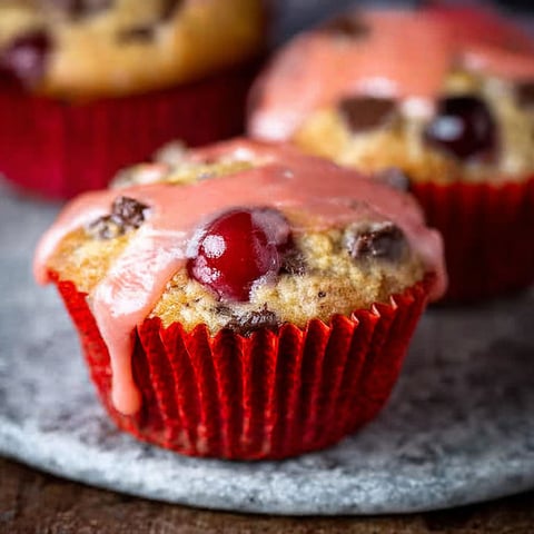 Cherry chocolate chip muffins with cherry glaze.