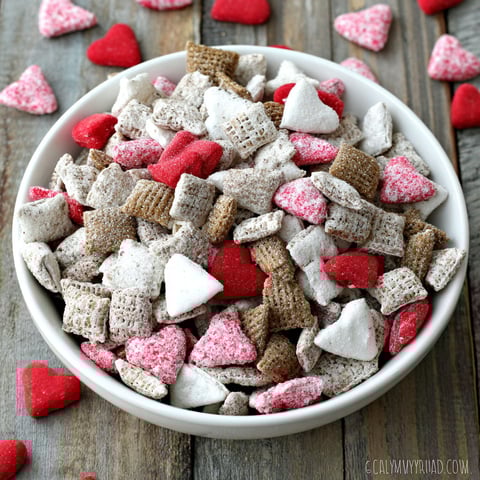 A bowl of cereal with hearts on it.